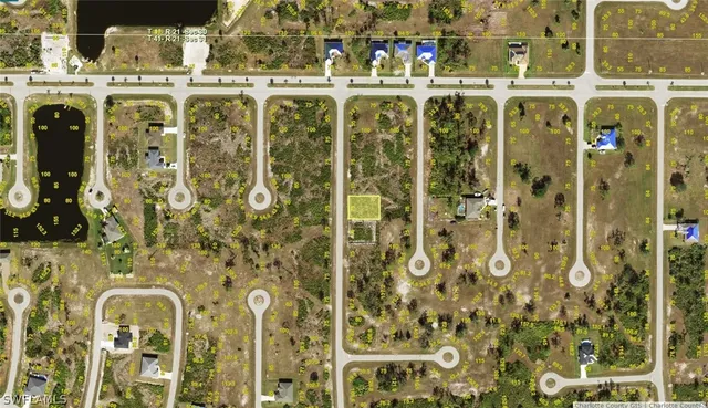 a large white building with glass windows and chandelier