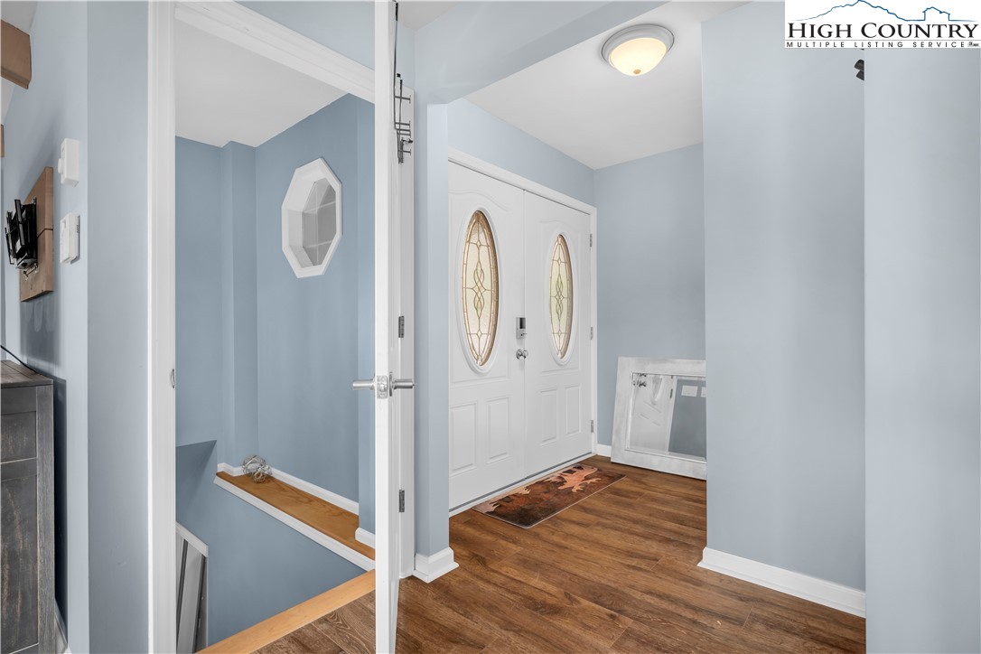 555 Glenview Road Newland, NC 28657 - Photo 25 of 49 a view of a hallway with wooden floor