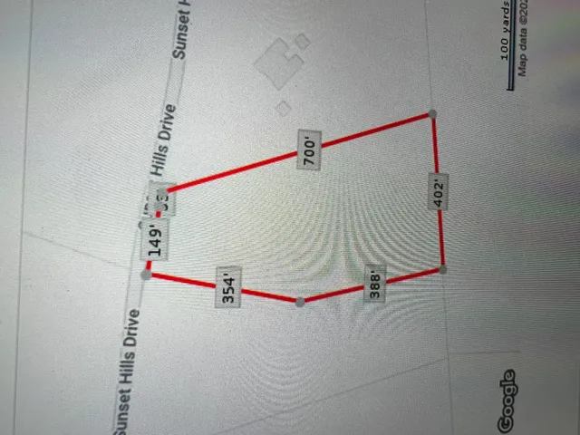 a bathroom with a shower and a shower head