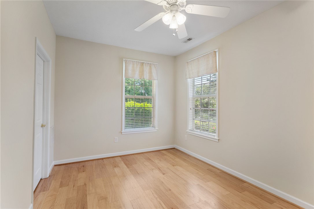 155 Life Style Lane Anderson, SC 29621 - Photo 25 of 49 Bright room with gleaming hardwood floors and large windows offers serene views.