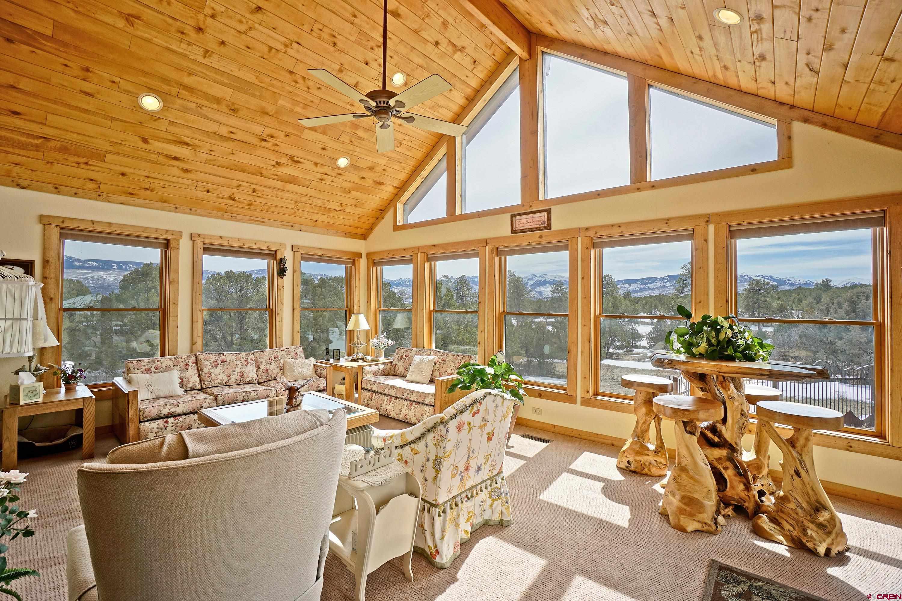 221 Waterview Lane Ridgway, CO 81432 - Photo 11 of 43 a living room with large windows