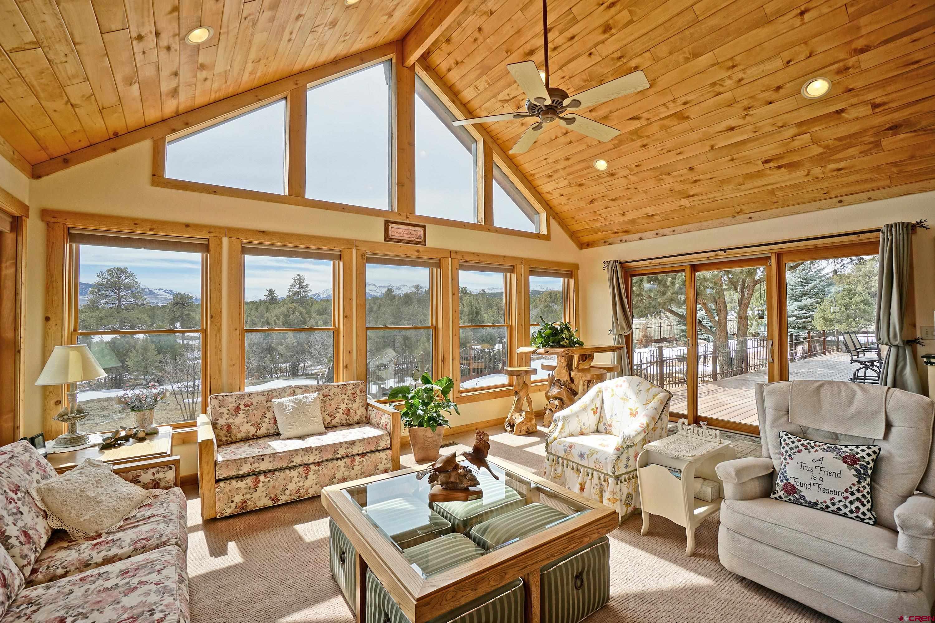 221 Waterview Lane Ridgway, CO 81432 - Photo 12 of 43 a living room with furniture and a large window