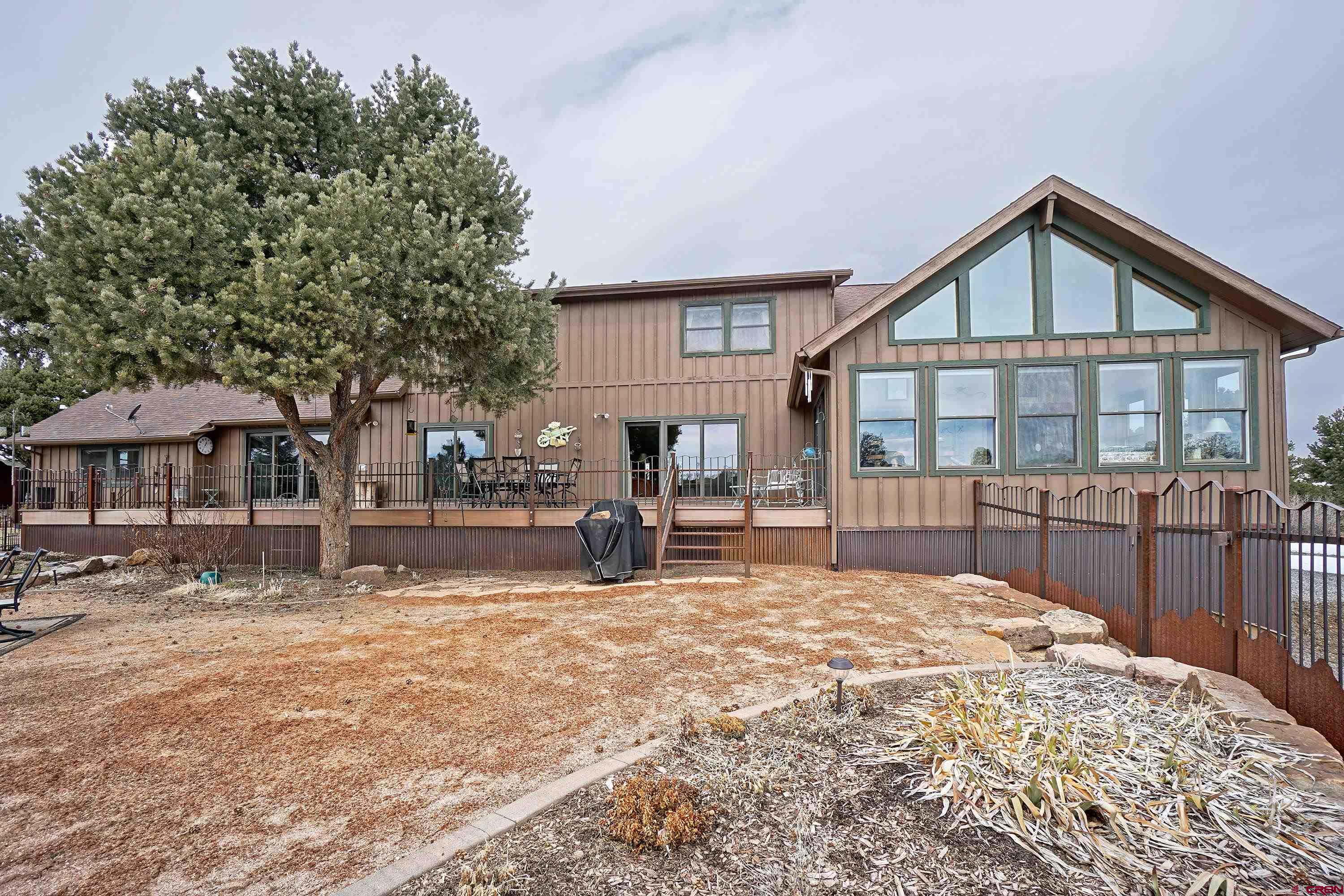 221 Waterview Lane Ridgway, CO 81432 - Photo 28 of 43 a view of house with yard and sitting area