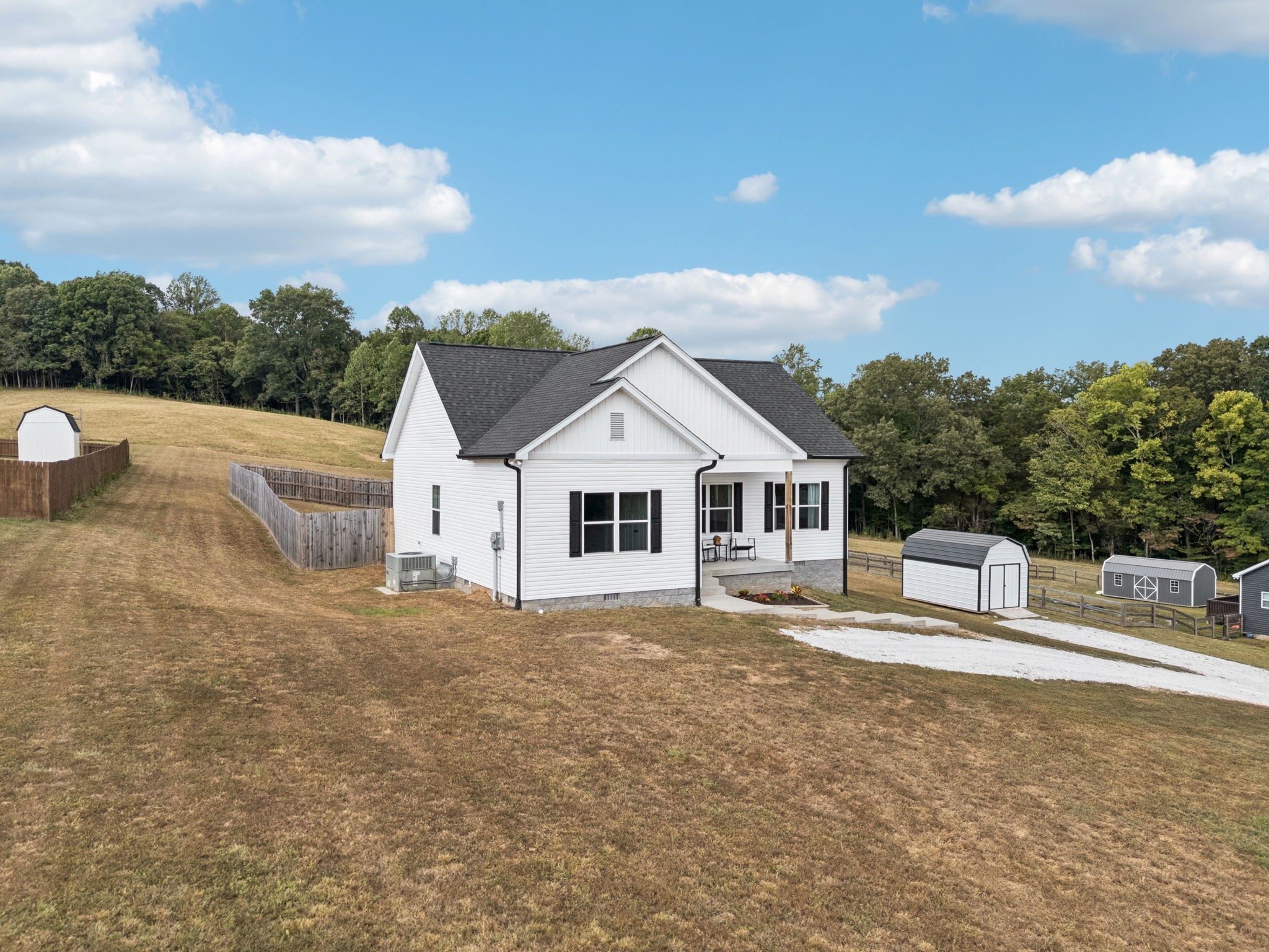 1220 Columbia Road Charlotte, TN 37036 - Photo 25 of 41 a view of a house with a yard