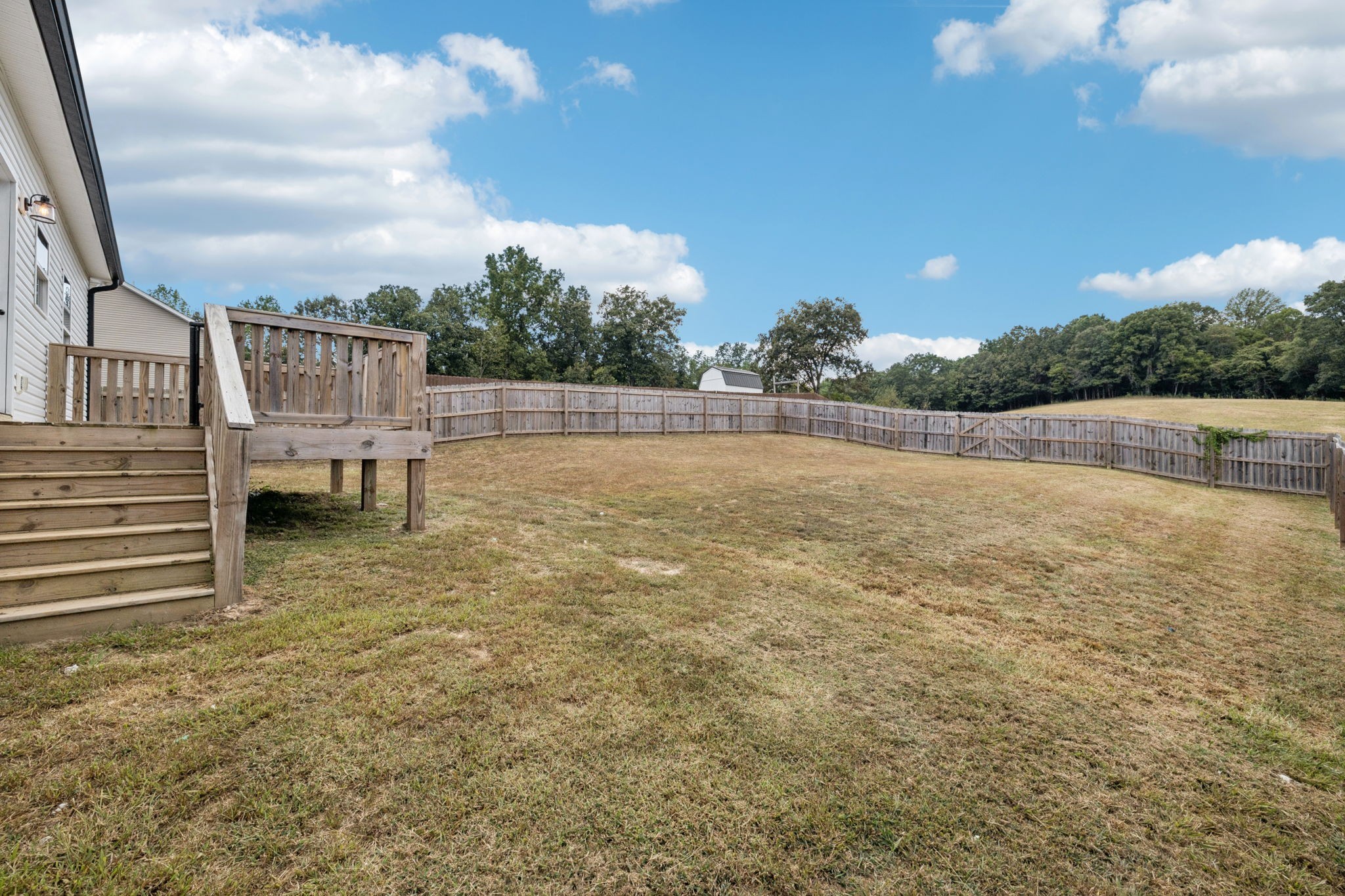 1220 Columbia Road Charlotte, TN 37036 - Photo 29 of 41 a view of a terrace with yard and mountain view in back