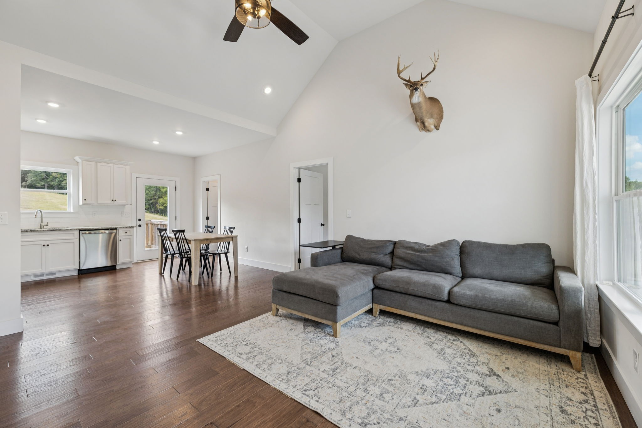 1220 Columbia Road Charlotte, TN 37036 - Photo 3 of 41 a living room with furniture and a view of kitchen