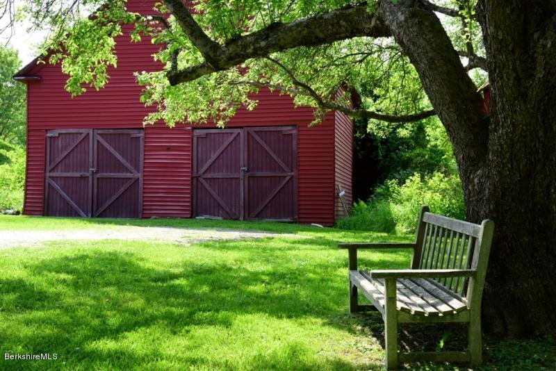 2922 State Road Richmond, MA 01254 - Photo 2 of 36 a view of backyard with wooden fence and a large tree