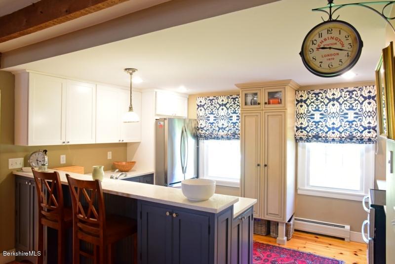 2922 State Road Richmond, MA 01254 - Photo 14 of 36 a view of a kitchen with a sink and a refrigerator