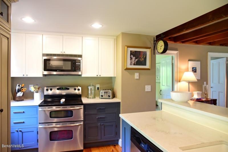 2922 State Road Richmond, MA 01254 - Photo 15 of 36 a kitchen with a stove and a microwave
