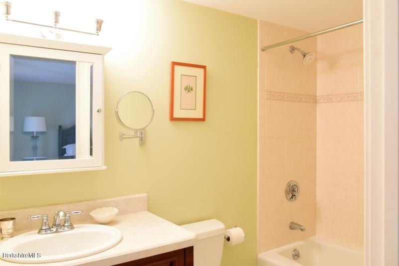 2922 State Road Richmond, MA 01254 - Photo 22 of 36 a bathroom with a sink a toilet and shower