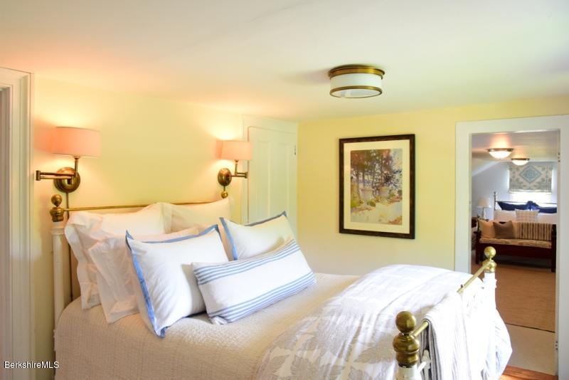 2922 State Road Richmond, MA 01254 - Photo 24 of 36 a bedroom with a bed and a couch