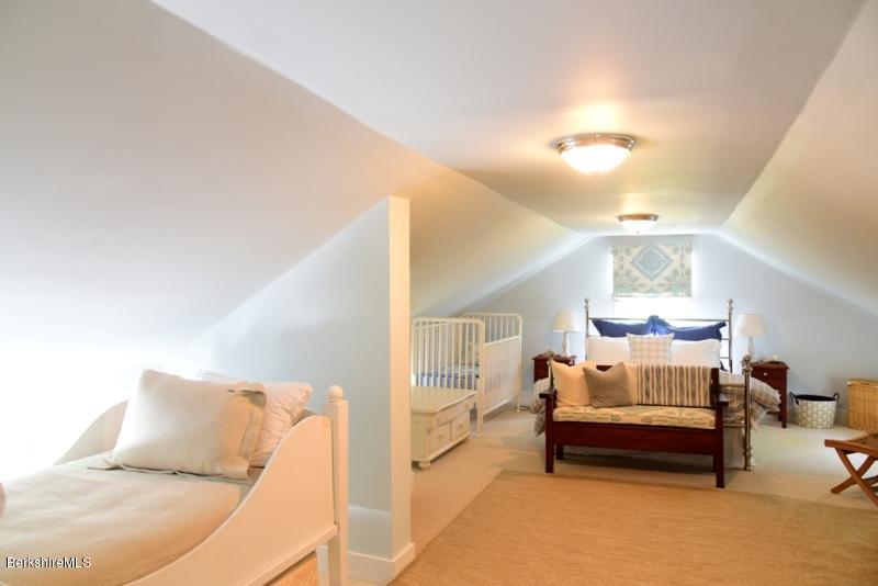 2922 State Road Richmond, MA 01254 - Photo 30 of 36 a bedroom with furniture and a lamp