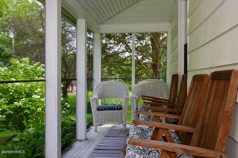 2922 State Road Richmond, MA 01254 - Photo 32 of 36 a view of a balcony with chairs and a stove
