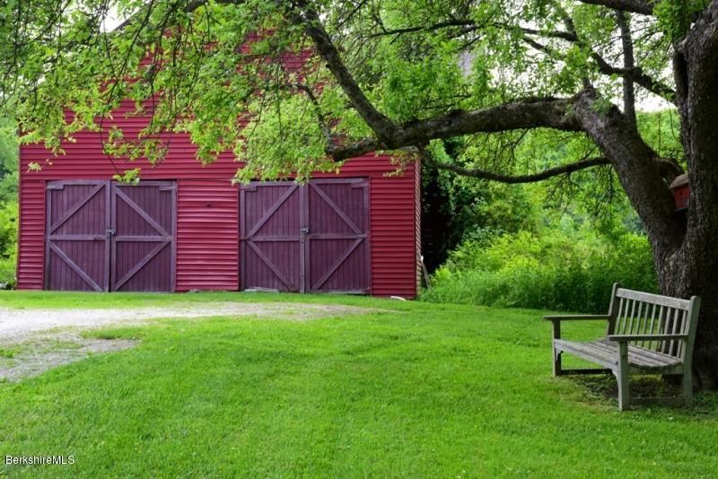 2922 State Road Richmond, MA 01254 - Photo 35 of 36 a view of a chair and table in the garden