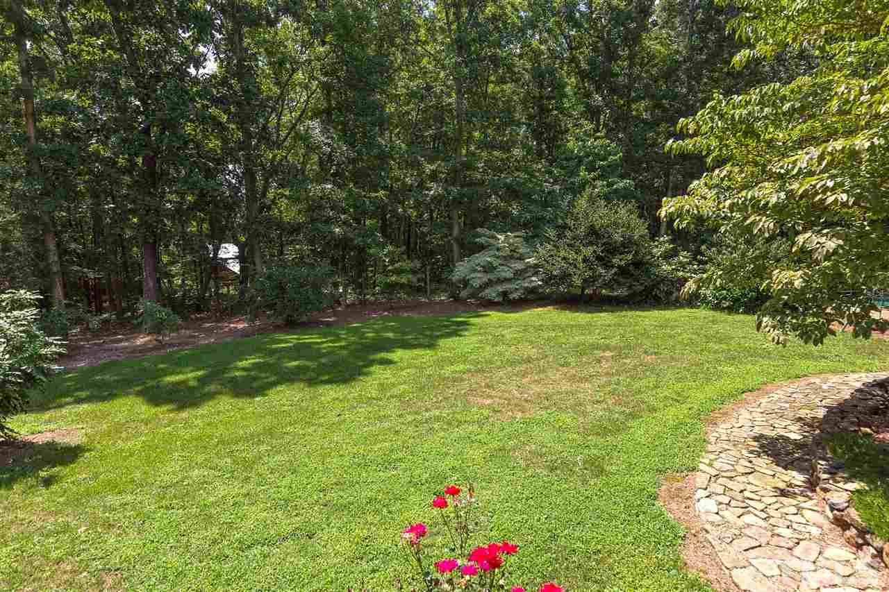 8500 McKee Road Rougemont, NC 27572 - Photo 4 of 25 a view of yard with swimming pool and green space