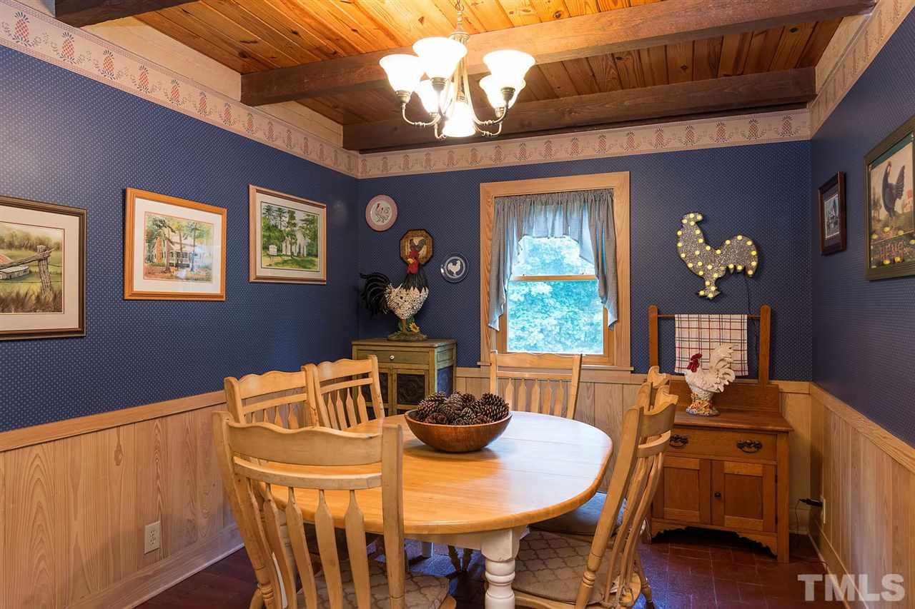 8500 McKee Road Rougemont, NC 27572 - Photo 10 of 25 a view of a dining room with furniture window and outside view