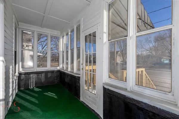 a view of balcony with a yard