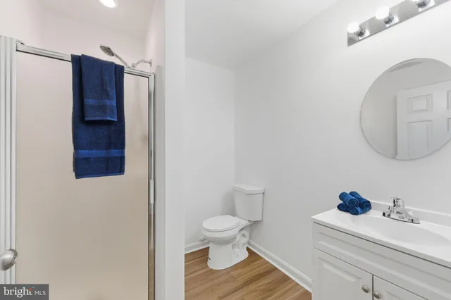 a bathroom with a toilet and a sink