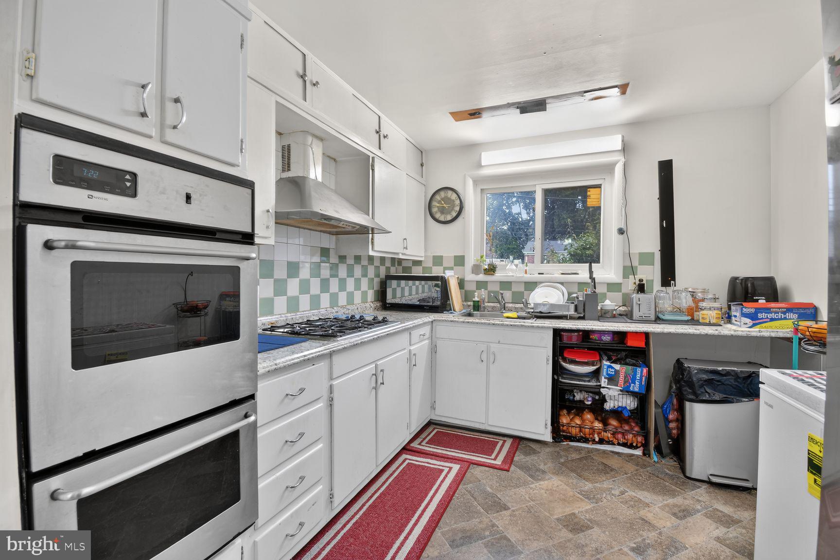 1207 Oakview Drive Silver Spring, MD 20903 - Photo 5 of 25 Bright and functional kitchen space.