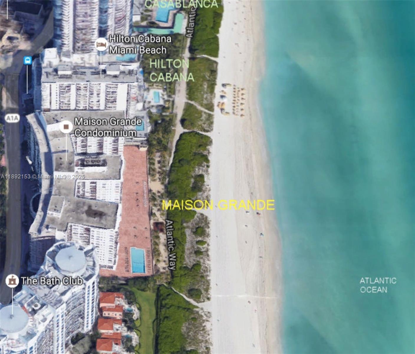 6039 Collins Avenue, Unit 311 Miami Beach, FL 33140 - Photo 7 of 26 an aerial view of a residential apartment building with a yard