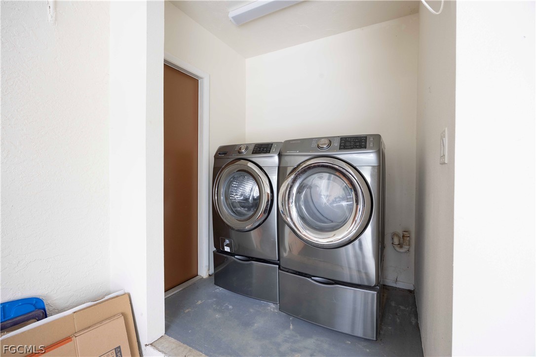 13520 Island Road Fort Myers, FL 33905 - Photo 30 of 36 a utility room with dryer and washer