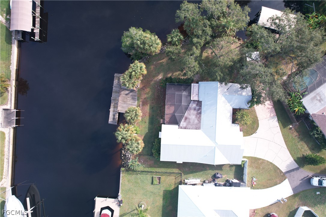13520 Island Road Fort Myers, FL 33905 - Photo 32 of 36 a picture of a bathroom with a sink and mirror