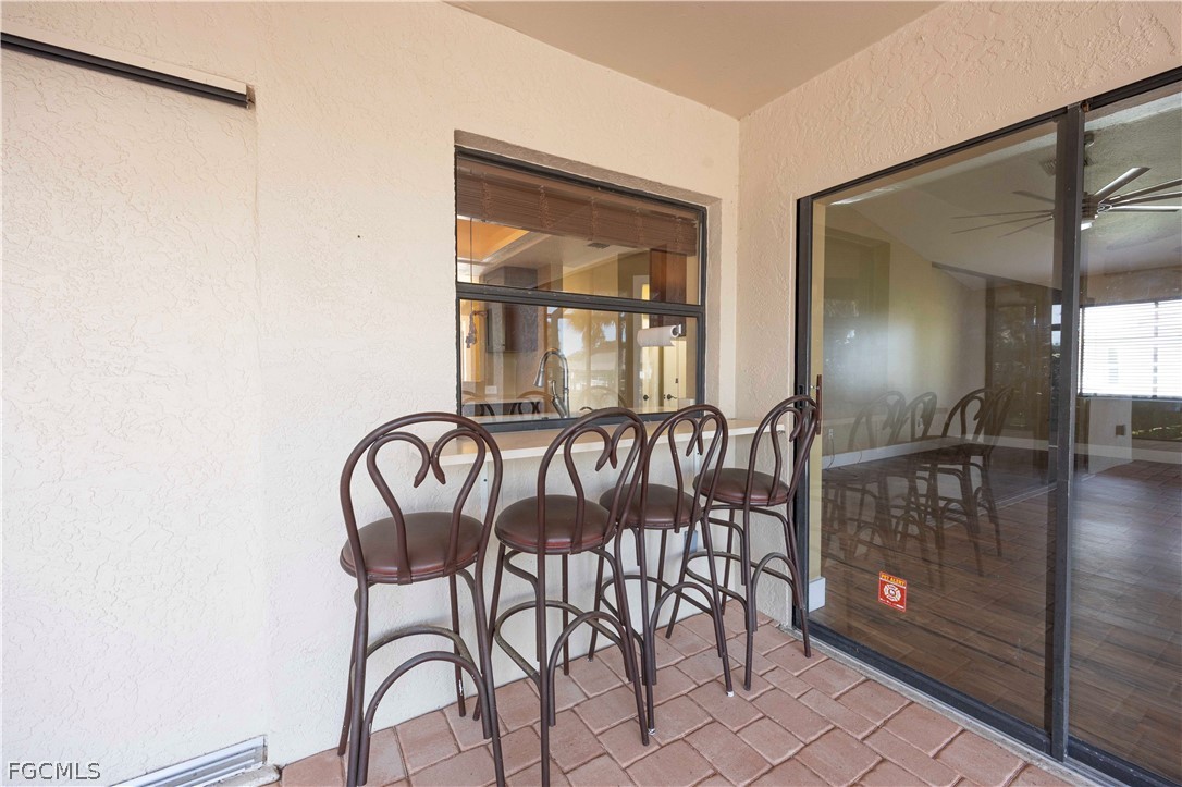 13520 Island Road Fort Myers, FL 33905 - Photo 7 of 36 a view of a room with furniture and chandelier
