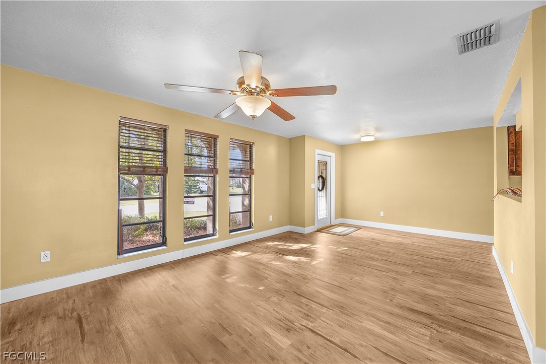 13520 Island Road Fort Myers, FL 33905 - Photo 9 of 36 a view of an empty room with a window