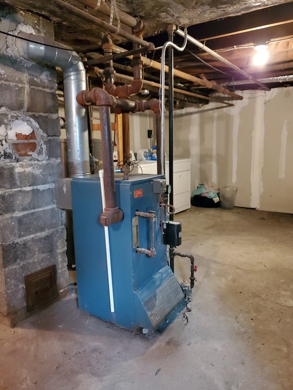 70-72 Windemere Street Springfield, MA 01104 - Photo 38 of 42 a room with gym equipment