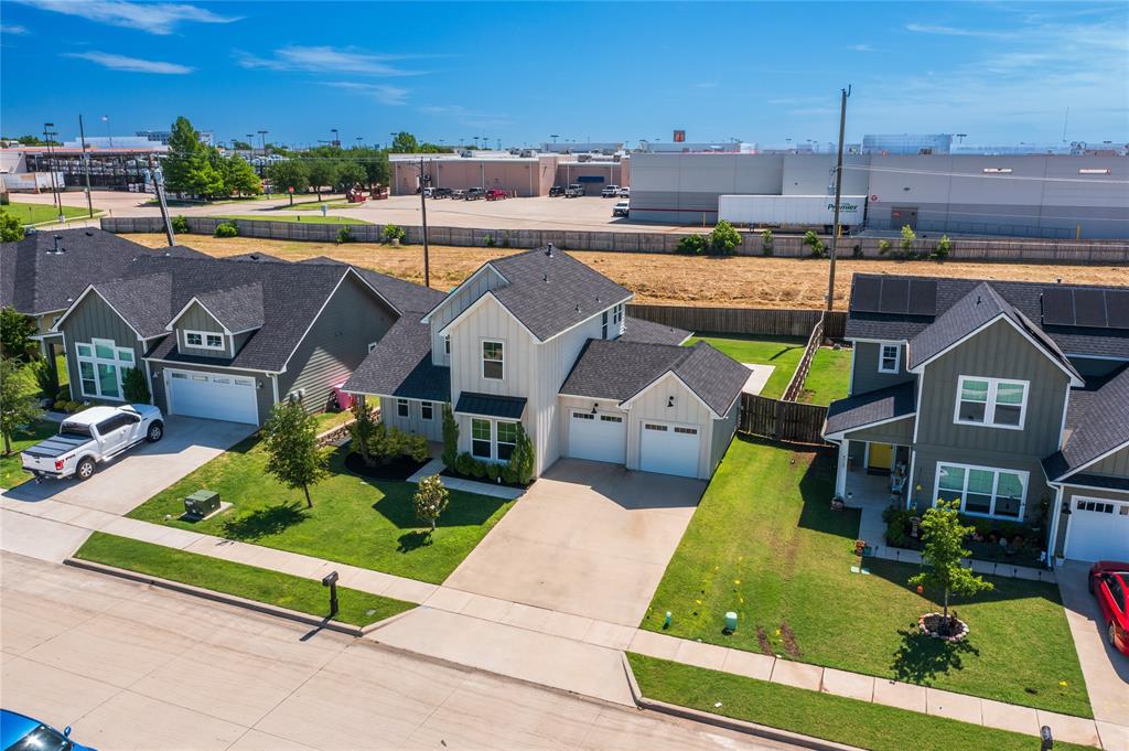 4721 Dry Creek Road Sherman, TX 75092 - Photo 25 of 25 an aerial view of a house with a garden and plants