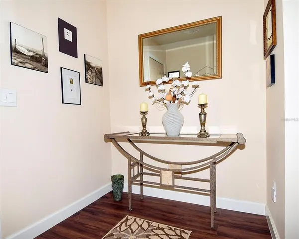 a dining room with table and hallway