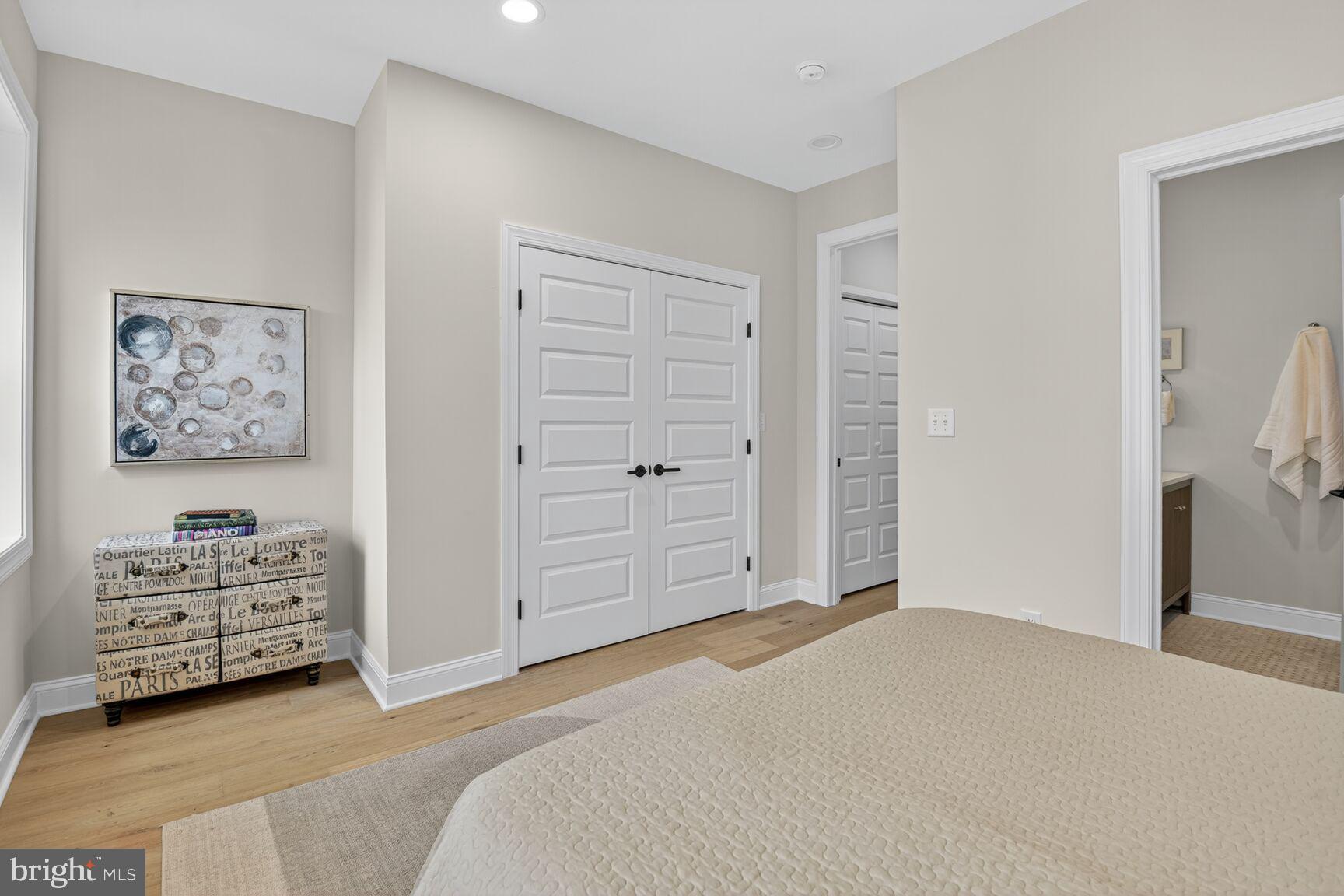 316 U Street Northwest Washington, DC 20001 - Photo 22 of 37 a bedroom with a bed and a cabinets