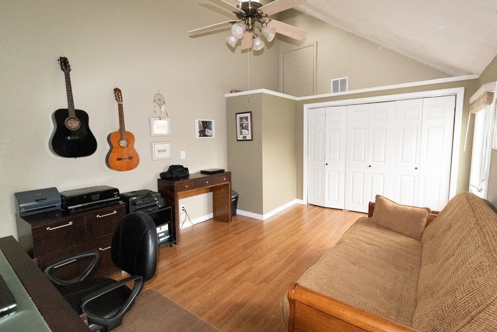 44 Flint Road Tyngsborough, MA 01879 - Photo 14 of 29 a bedroom with a bed and cabinets