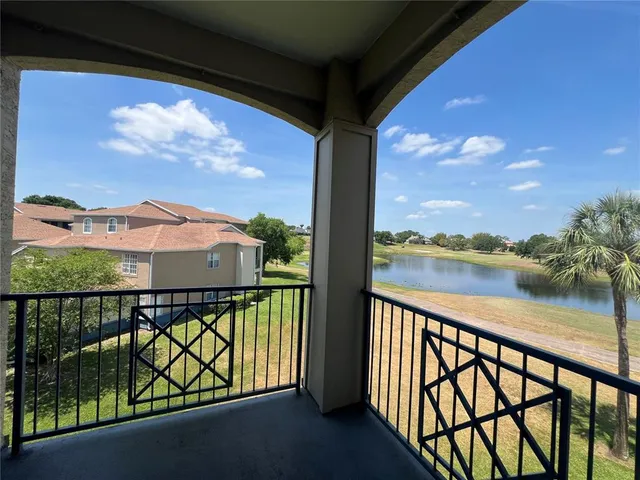 a view of a lake from a balcony