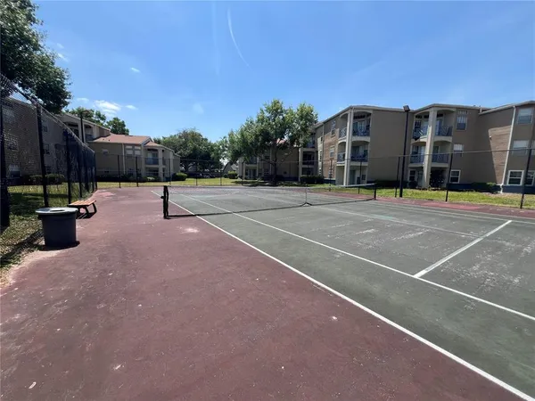 a view of a balcony with chairs