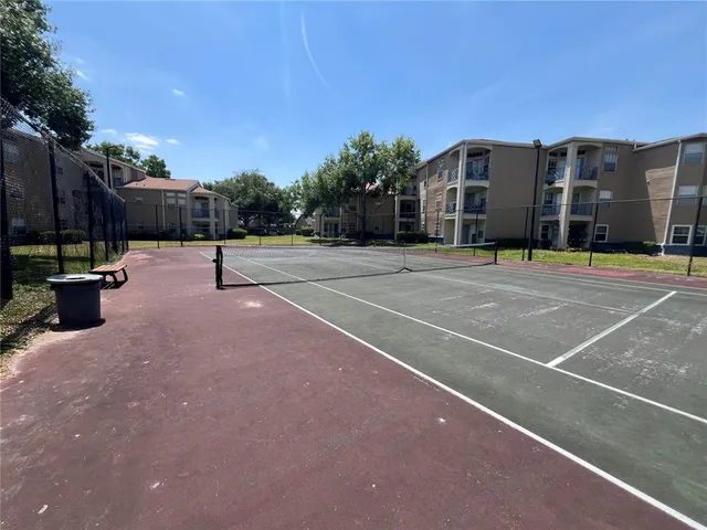 a view of a balcony with chairs
