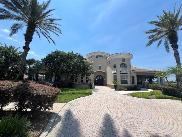 a view of a city from a dining room with furniture window and outside view
