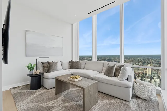 a view of a bathroom with a tub and shower