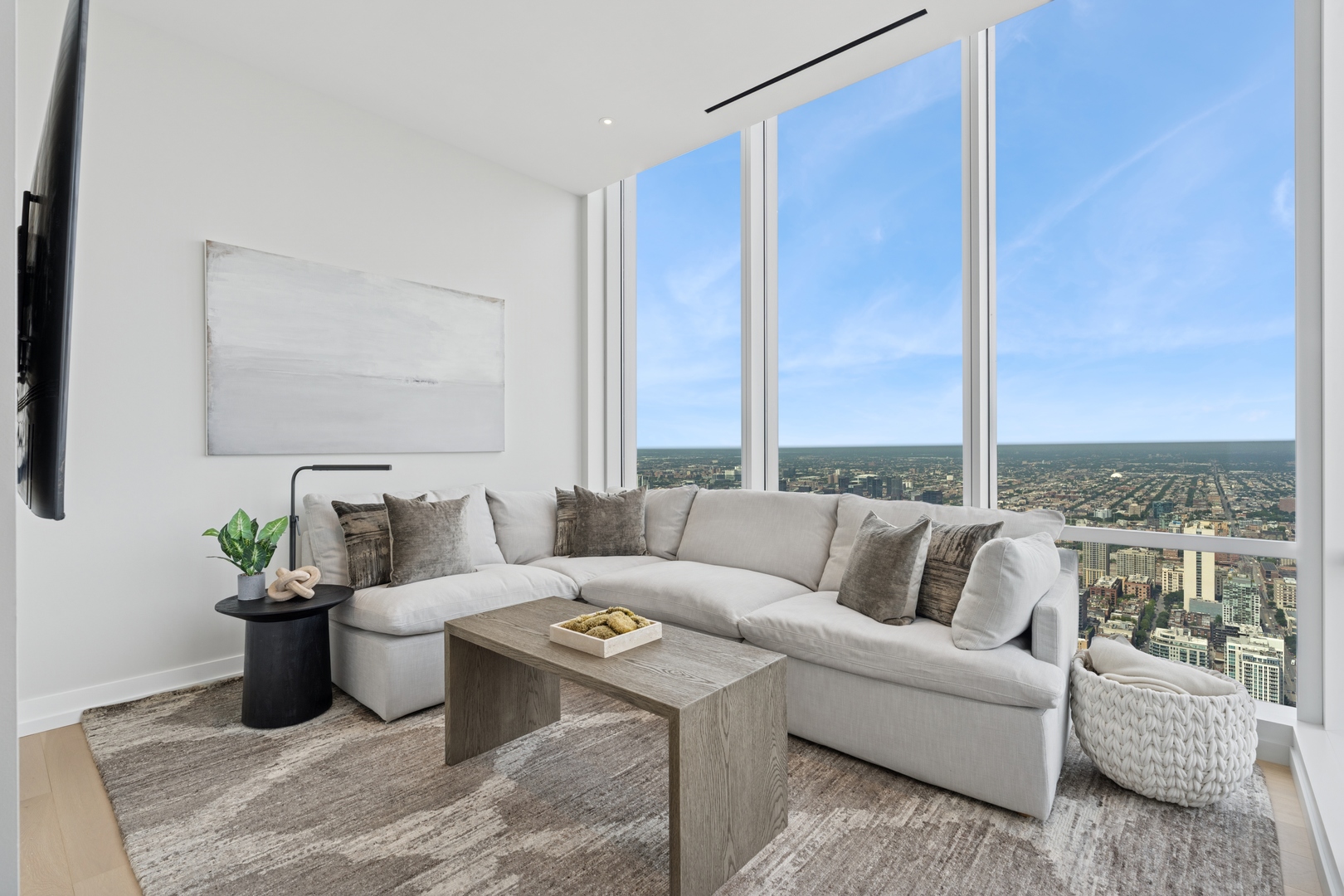 14 West Superior Street, Unit 6002 Chicago, IL 60654 - Photo 16 of 44 a living room with furniture and a large window
