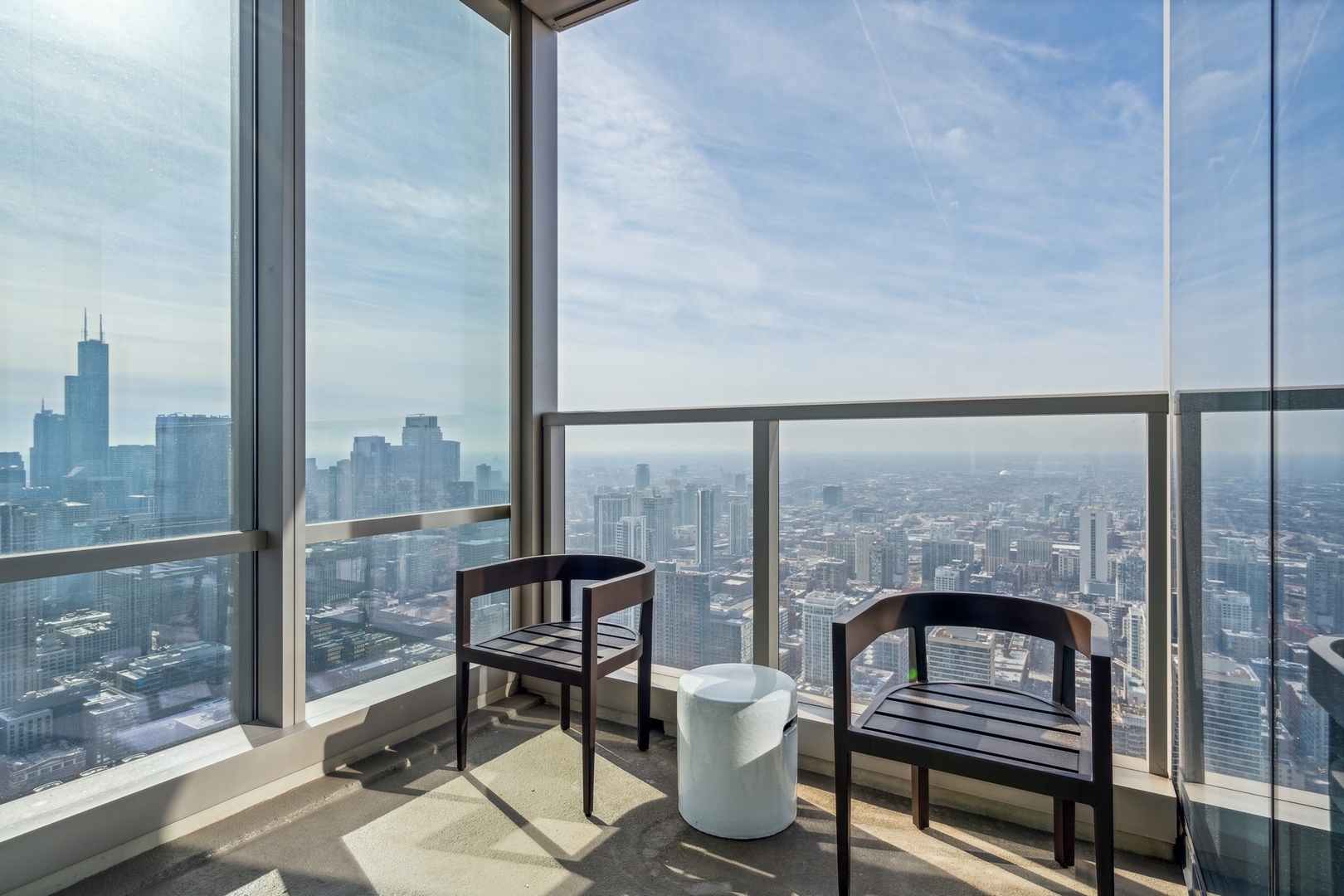 14 West Superior Street, Unit 6002 Chicago, IL 60654 - Photo 20 of 44 a balcony with furniture and a gate