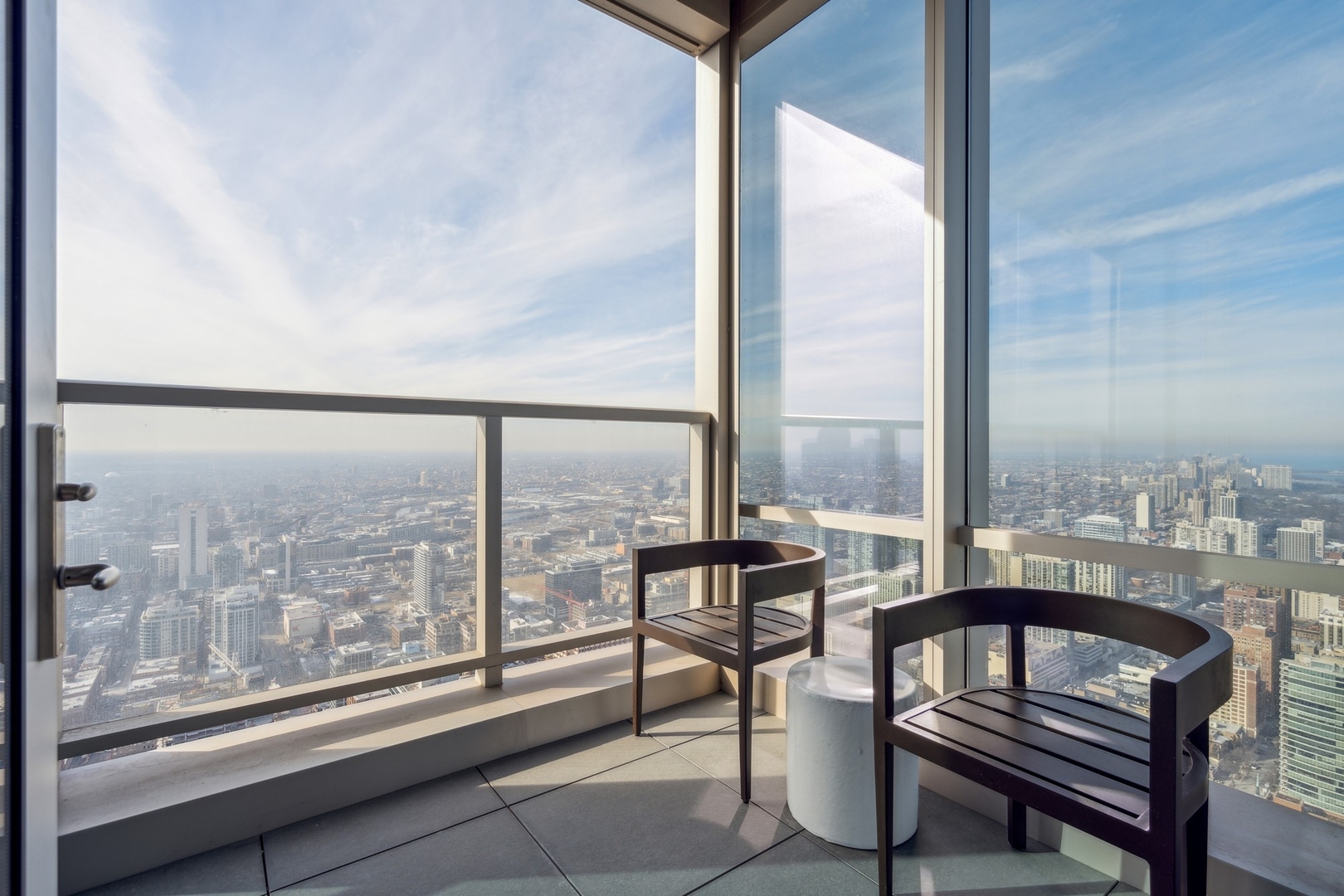 14 West Superior Street, Unit 6002 Chicago, IL 60654 - Photo 8 of 44 a view of a room with wooden floor and iron stairs