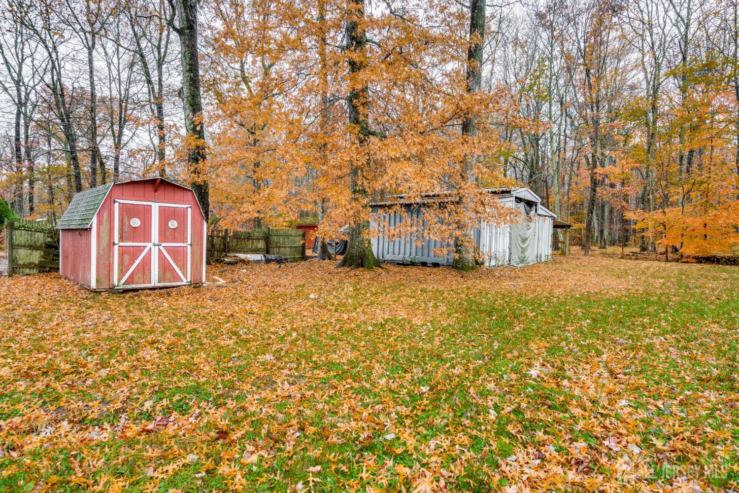 113 Fresh Ponds Road Monroe Township, NJ 08831 - Photo 14 of 18 a view of a yard with large trees