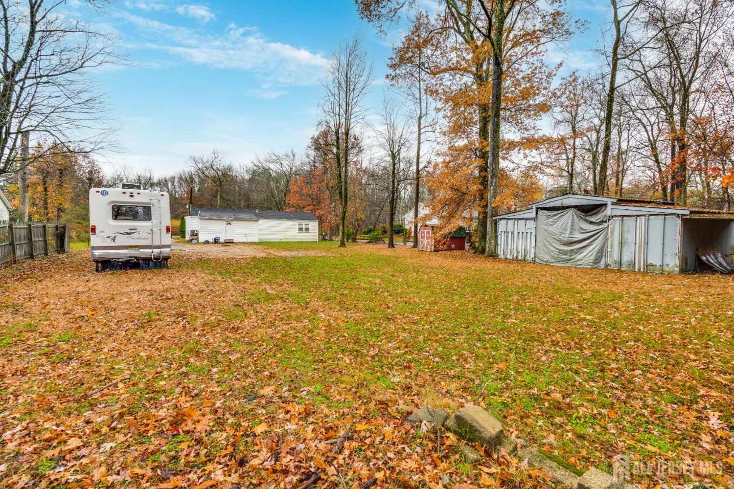113 Fresh Ponds Road Monroe Township, NJ 08831 - Photo 17 of 18 a view of a yard with swimming pool