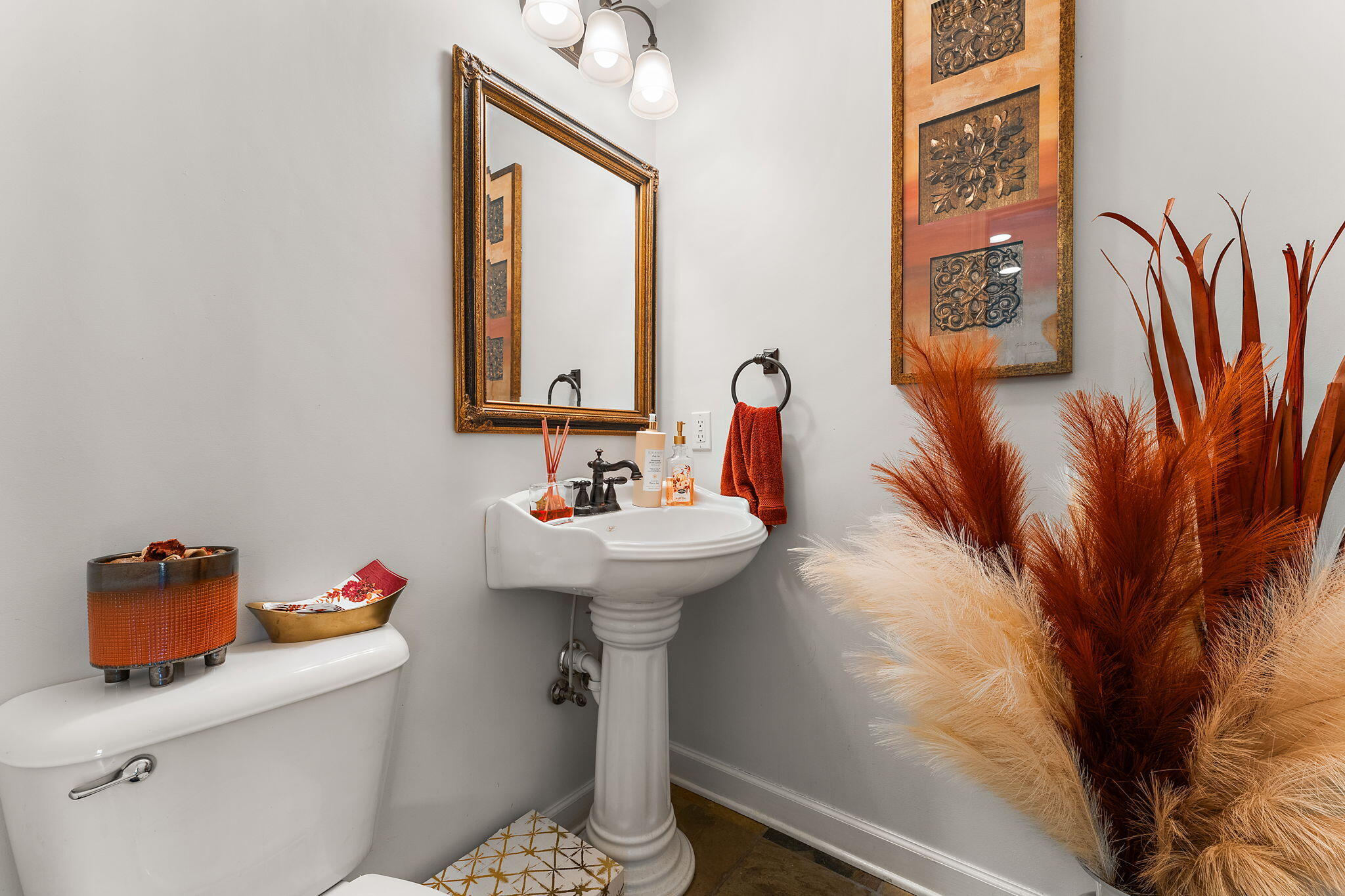 5371 72nd Avenue Schererville, IN 46375 - Photo 12 of 28 a bathroom with a sink toilet and a mirror