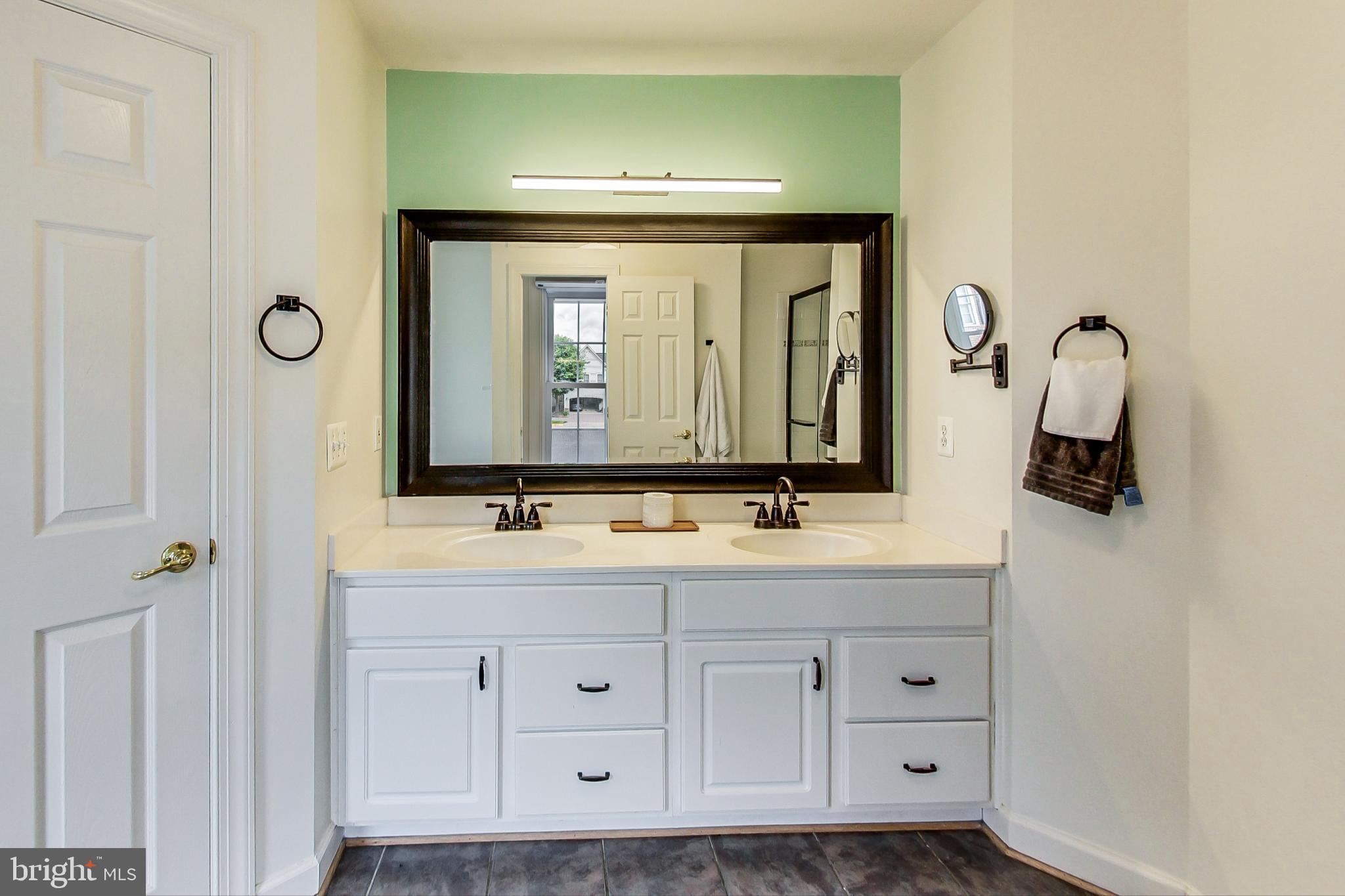 7724 Tea Table Drive Lorton, VA 22079 - Photo 24 of 47 Primary bathroom with 2 sinks