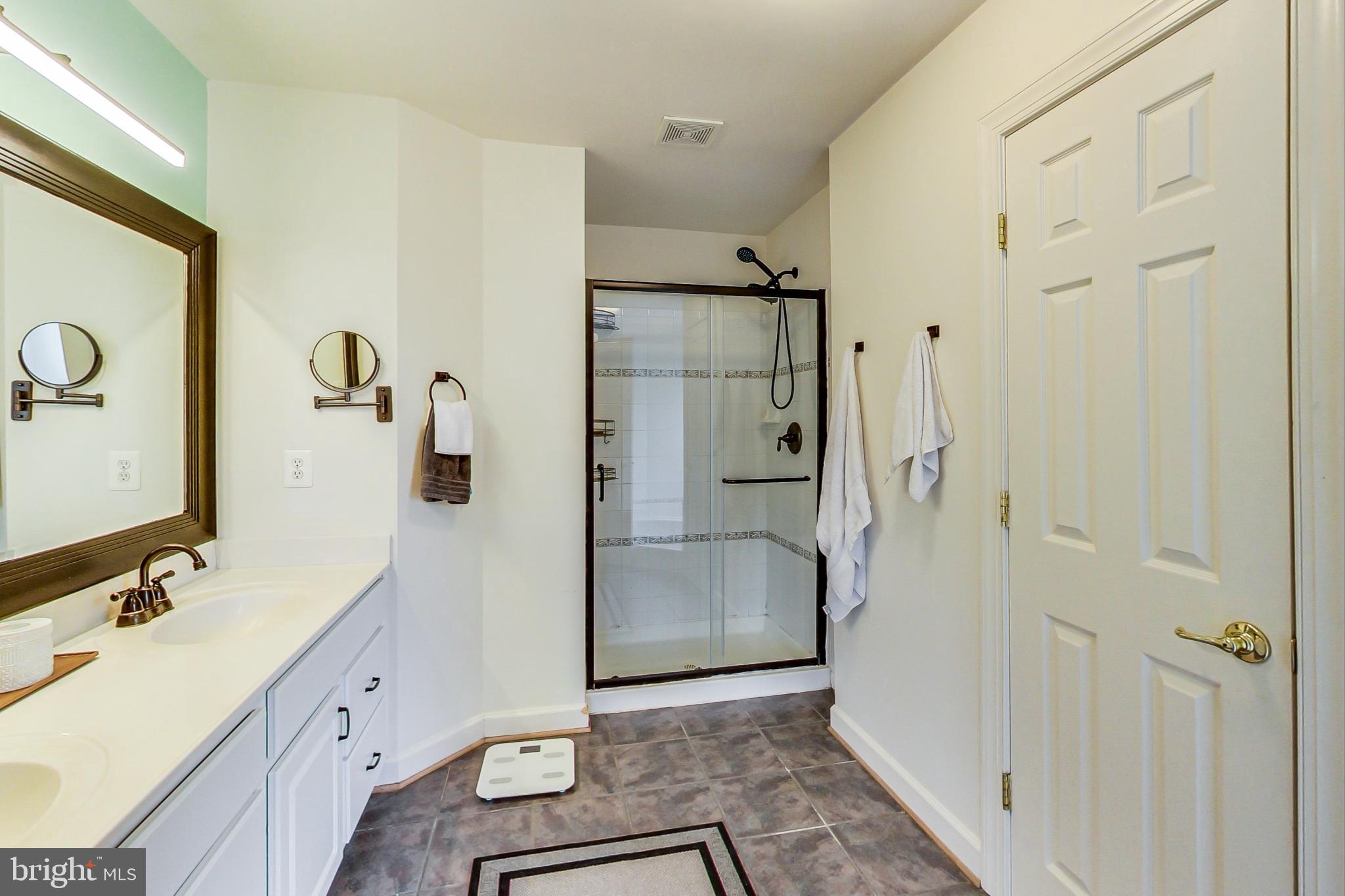 7724 Tea Table Drive Lorton, VA 22079 - Photo 25 of 47 Primary bathroom with separate shower