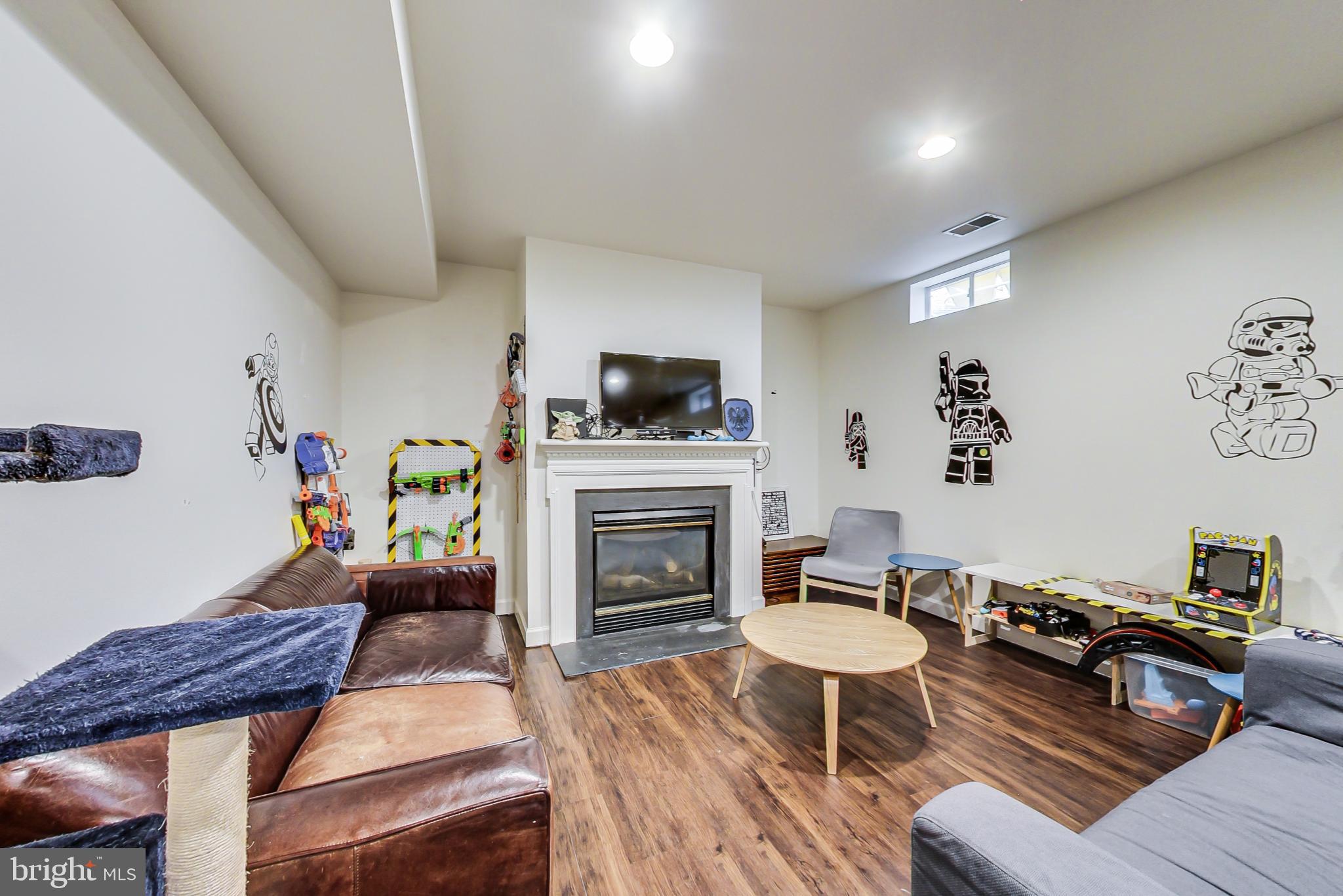7724 Tea Table Drive Lorton, VA 22079 - Photo 40 of 47 Family room with fireplace in basement