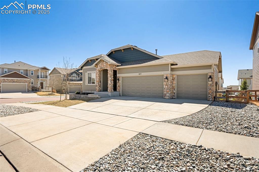 977 Salmon Pond Way Colorado Springs, CO 80921 - Photo 1 of 49 a front view of a house with a yard
