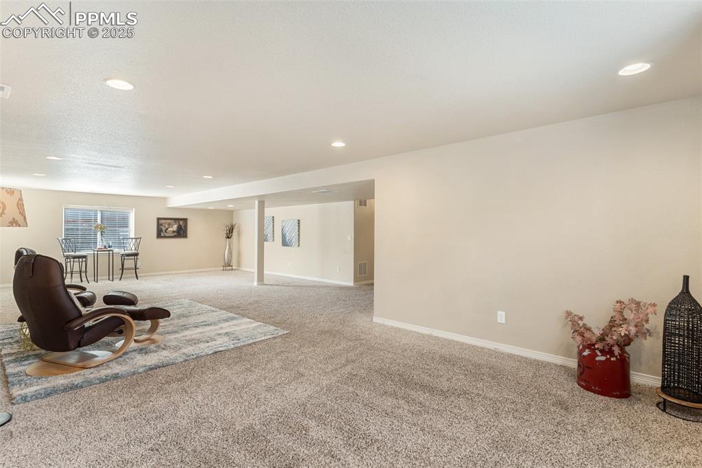977 Salmon Pond Way Colorado Springs, CO 80921 - Photo 33 of 49 a view of a livingroom with workspace