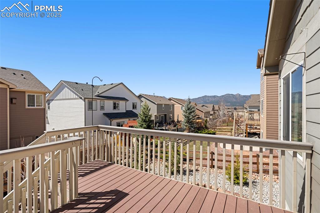 977 Salmon Pond Way Colorado Springs, CO 80921 - Photo 41 of 49 a view of a street with wooden fence